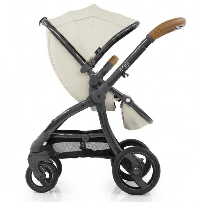 Прогулочная коляска Egg StrollerStroller Прогулочная коляска Egg StrollerStrollerПрогулочная коляска Egg Stroller была создана в Великобритании, учитывая принципы осознанного родительства. Мягкие на ощупь ткани создают плавные волнистые и непрерывные линии, придающие коляске роскошный и стильный внешний вид. Незаурядная инженерия создает возможность совершенной перевозки ребенка и максимально легкого использования коляски родителями. Изначально EGG поставляется, как прогулочная коляска для детей от 6 месяцев, но с легкостью может быть преобразована в коляску для новорожденного (с использованием люльки Carrycot), систему для путешествий (с использованием переходников на детское автомобильное кресло 0+) и/или даже в коляску для двойни/погодок (с использованием переходников и кресле второго ребенка) Шасси с удобной шириной 59 см складывается компактно одной рукой и его можно вертикально поставить в собранном положении. Блокирующиеся передние колеса, амортизация всех колес и не прокалываемые шины Tru-Ride Technology делают перевозку очень комфортной, плавность хода высокой, а управляемость превосходной. Просторный и удобный прогулочный блок реверсивный, поэтому может быть установлен в любом из двух направлений движения: лицом вперед или к родителям, сиденье имеет 3 регулировки наклона и регулируемую подножку. Удобная, красивая и надежная ручка коляски с 5-мя регулировками по высоте выполнена из качественной экокожи. Максимальная грузоподъёмность коляски до 25 кг для одиночного варианта, и по 15 кг на каждое сиденье в двойной версии. Легкоснимаемый бампер из экокожи, повторяющий цвет ручки, большой и роскошный капор в 3 сложения, накидка на ножки, дождевик и москитная сетка включены в стандартную комплектацию и обеспечивают максимальный комфорт и уют для ребенка и родителей. Особенности: Мягкий благородный ход и хорошая управляемость британской коляски Складывание шасси одной рукой Реверсивный прогулочный блок (лицом вперед или к родителям) с глубоким сиденьем Ножной тормоз, сохраняющий чистоту обуви и не повреждающий её. Амортизация всех колес Не прокалываемые и легкоснимаемые колеса, Коляска оснащена передними колесами, вращающимся на 360 градусов, с функцией блокировки движения вперед-назад. Регулируемая по высоте ручка (5 положений) из качественной экокожи Пятиточечные ремни безопасности Трёхуровневая регулировка спинки сиденья Четырехуровневая регулируемая подножка Три положения капора Легко съёмный бампер из экокожи в цвет ручки Возможность установки детского автомобильного кресла 0+ MAXI-COSI и совместимых с ним по способу крепления (посредством переходников (отдельная опция)) Установка люльки для новорожденных Комфортная общая ширина коляски – 59 см. Ручка для переноски шасси Шасси фиксируется в сложенном виде и стоит вертикально без поддержки Размеры и вес: Шасси в собранном виде с колесами: 67x29x59 см Шасси в собранном виде без колес: 67x23x50 см Высота ручки: 94-105 см Вес шасси с колесами: 9.7 кг Вес сиденья: 3.8 кг Вес шасси с колесами и сиденьем: 13.5 кг Внутренние размеры сиденья: 27х30 см (24 см возле самой спинки, т.к. сиденье имеет удобную закругленную форму) Высотка спинки сиденья: 49 см. Максимальная грузоподъемность для одиночной версии: 25 кг Максимальный вес ребенка в двойной варианте: 15 кг каждый. Комплектация: Шасси Прогулочный блок с капором Накидка на ножки Москитная сетка Дождевик<br>