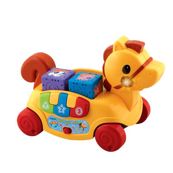 Каталка-игрушка Vtech Обучающая пони 80-111126Обучающая пони 80-111126 Каталка-игрушка Vtech Обучающая пони 80-111126Обучающая пони 80-111126Развивающая игрушка Vtech Обучающая пони подходит малышам от 6 месяцев . Игрушка в виде маленького пони на колесиках , не оставит равнодушным вашего малыша. Малыш может толкать игрушку, или тянуть за веревочку. На боку пони есть клавиши, имитирующие клавиши пианино с цифрами. Клавиши трех цветов - красный, синий и зеленый. В спинке лошадки - пазы для больших кубиков с объемными рисунками для развития тактильного восприятия. Кубики можно вынимать и вставлять обратно. Игрушка озвучена: проигрывает веселые мелодии и говорит несколько фраз. Особенности игрушки: 2 режима игры игрушку можно катать учим цвета пианино светящиеся кнопки профессиональная одноголосая русская озвучка кнопка включения и выключения режимов<br>