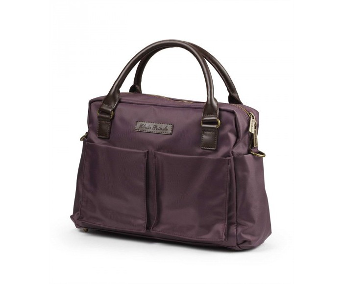 Elodie Details Сумка Plum LoveСумка Plum Love Elodie Details Сумка Plum LoveСумка Plum LoveElodie Details Сумка Plum Lovea отлично подходит для прогулок с ребёнком. Особенности: Практичная и очень стильная сумка для коляски сделана из прочного и легкочистящегося оксфордского полиэстера с деталями из натуальной кожи Длинные ремни позволяют повесить сумочку на ручки коляски Скрытые термо-карманы Smart помогут держать бутылочки малыша в нужном температурном режиме В комплектацию также входит мягкий и удобный матрасик для пеленания Множество карманов, предназначенных для подгузников, влажных салфеток, ключей, мобильного телефона, зеркальца и других мелочей Легко поместит ноутбук при надобности Высококачественные детали из натуральной кожи.<br>