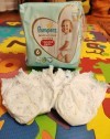 23426 Pampers - Premium Care Extra Large .6 (15+ ) 31 .   